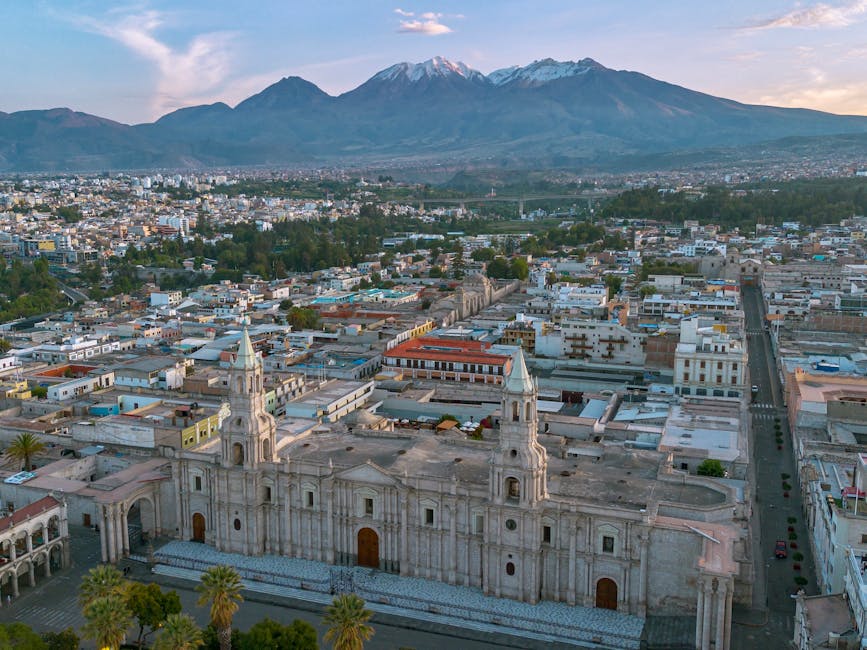 Stunning aerial view of Arequipa with majestic cathedral and Andean mountains in Peru.