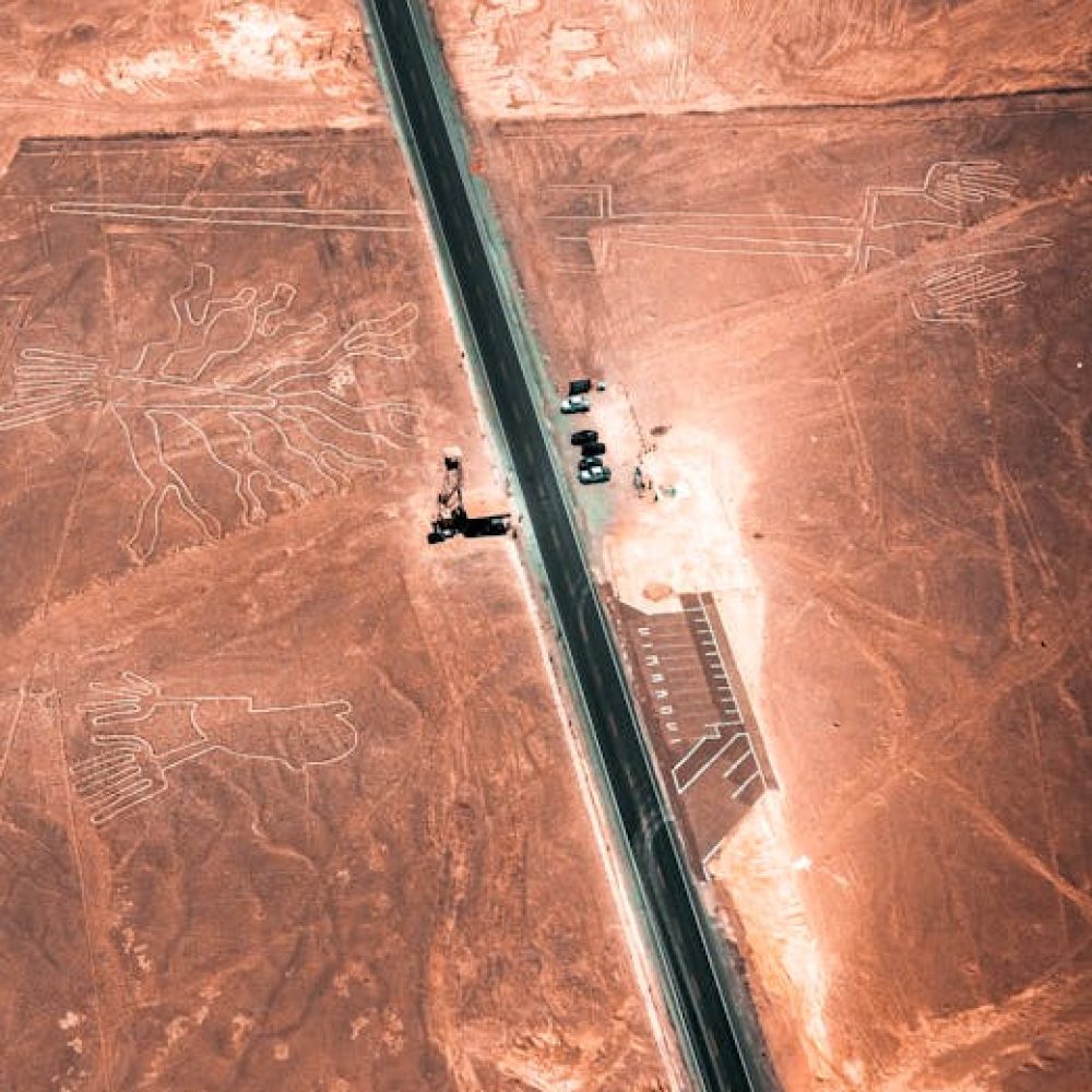 A stunning aerial view of the famous Nazca Lines in Peru's desert, showcasing intricate geoglyphs.
